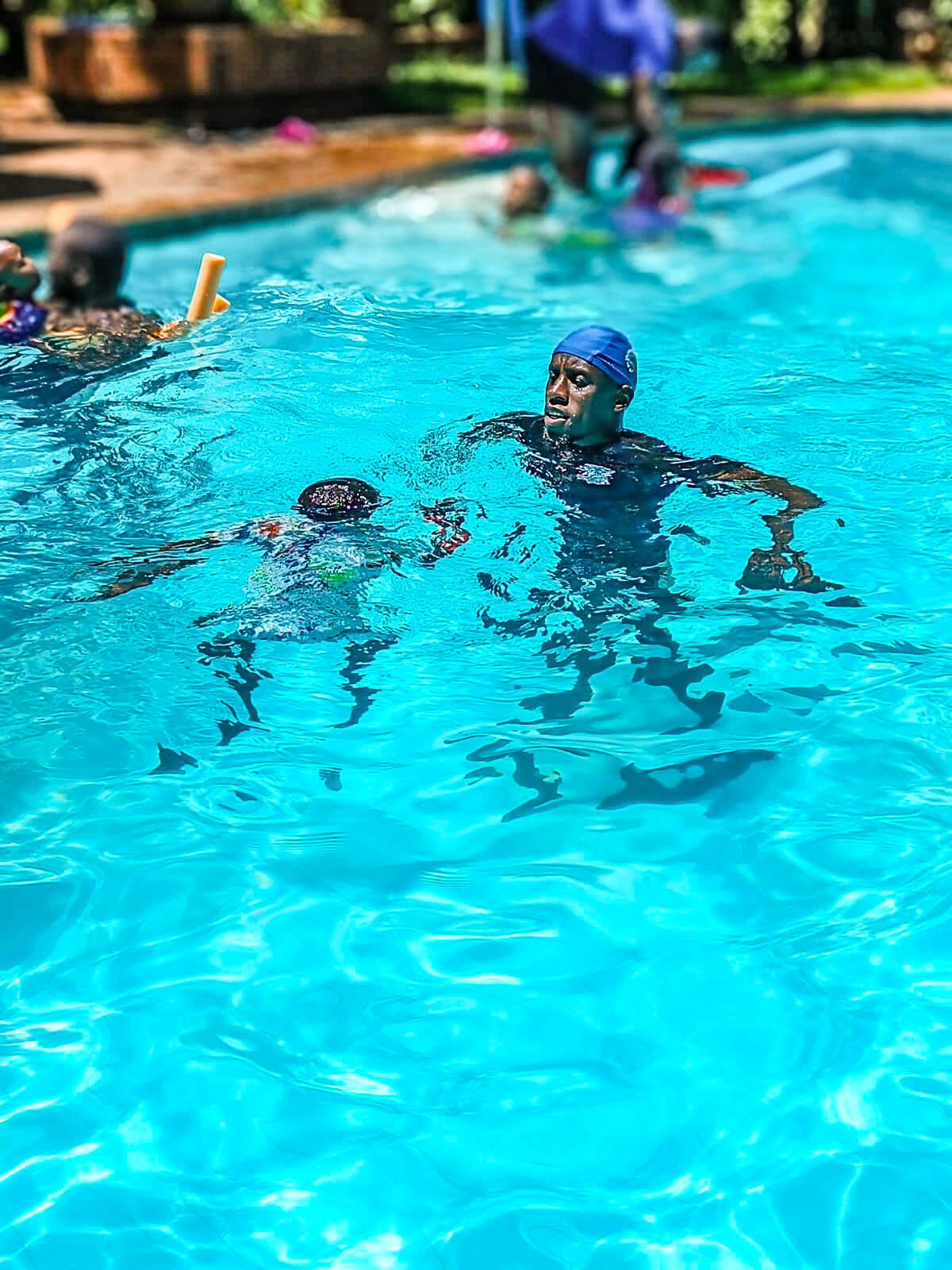 Swimmers racing in lanes during practice